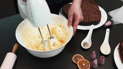 Preparing Frosting for Delicious Cake at Home