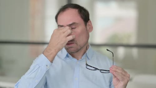 Middle Aged Man Having Headache