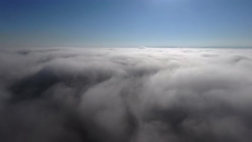 Aerial View of Clouds Under Blue Sky