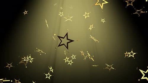 Las estrellas doradas de Navidad caen a través de los rayos.