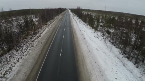 Flying over empty road in the north