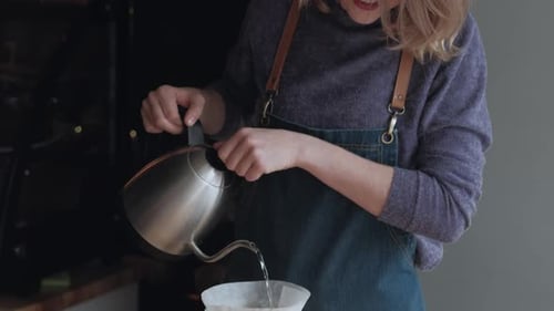 Woman Making Pour Over Coffee at Home