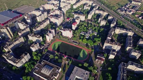 Aerial Drone of a Small Stadium Camera Down