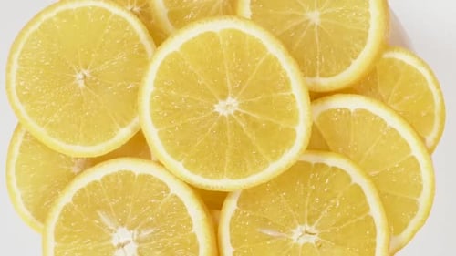 Oranges on a White Plate