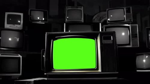 Retro TV Green Screen in the Middle of Many TVs, Color to BW Tone.