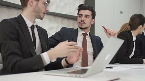 Young Professionals Meeting at Modern Office Workplace