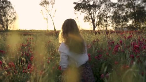 Dancing and running in a blooming field