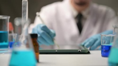 Scientist Using Tablet in Lab