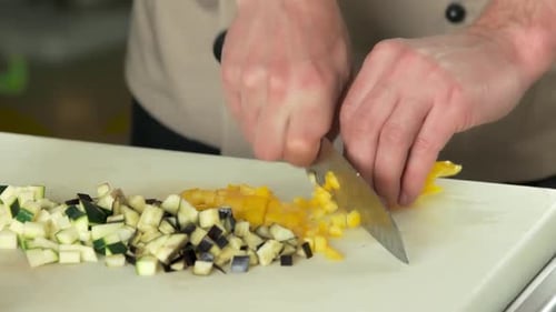 Chef Dices Fresh Vegetables for Culinary Creation