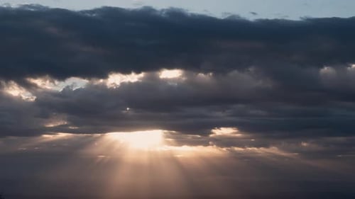 Heavenly Sunrays Shining Through Clouds Time Lapse