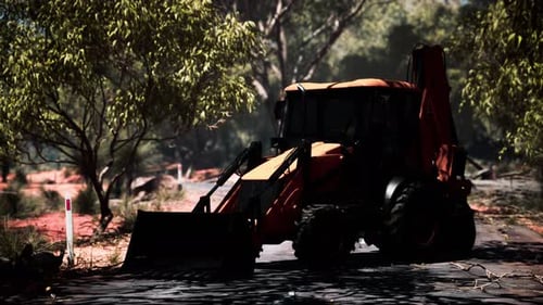 Tractor excavador en Bush Forest
