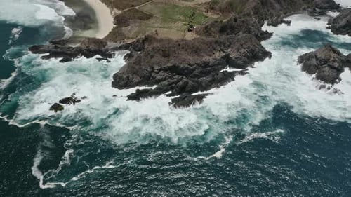 Ocean in Indonesia with Bright Sun Glistening Against Water