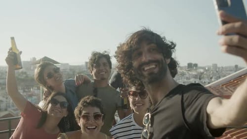 Young Adults Take Selfie on Rooftop