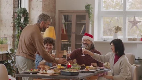 Festive Family Cheers at Christmas Dinner