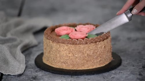 Hand Slices Decorative Cake with Knife