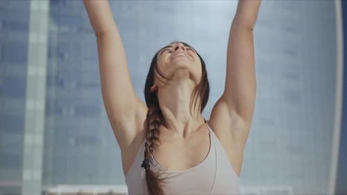 Woman Doing Namaste Yoga Pose on Street. Lady Practicing Yoga on City Street