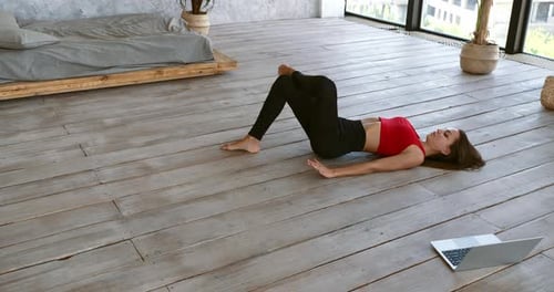 Woman Doing Floor Exercises at Home