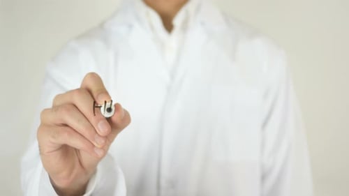 Doctor Writing Health Insurance Close Up