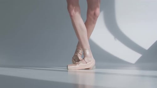 Elegant Ballerina Feet Performing Delicate Ballet Moves