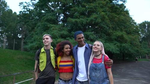 Positive Group of Young People Hugging Walking Street, Friendship Togetherness