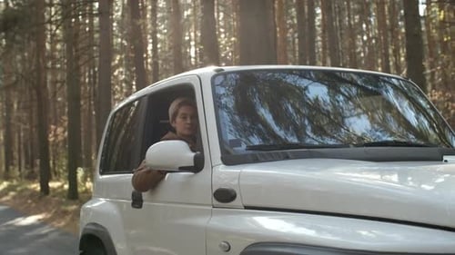 Woman Looking Out of Car Window