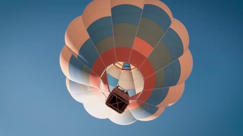 Eye-catching Hot Air Balloon Floating in a Blue Sky