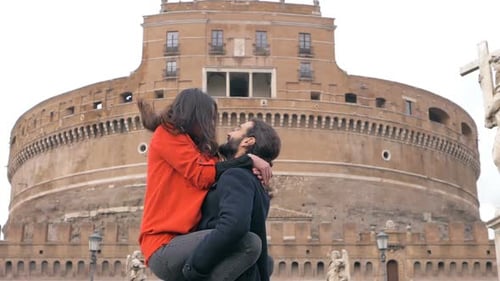 Loving Couple Embrace at Castel Sant'Angelo in Rome