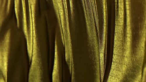Golden Textured Fabric Fluid Motion Background