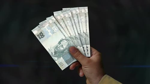 Brazil Real, Reai money fan of banknotes in hand