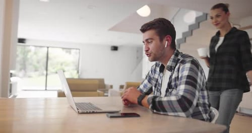 Couple Video Chats Together in Modern Home
