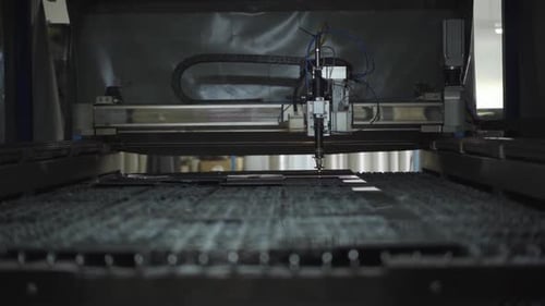 Inside of Modern Metal Cutting Machine. Automated Equipment in Work. Steel Production Plant