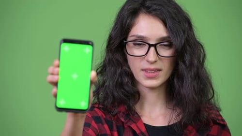 Young Beautiful Businesswoman Showing Phone