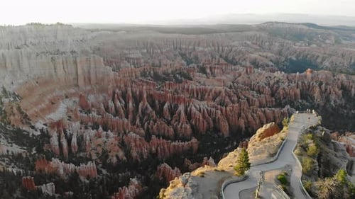 Bryce Canyon National Park Utah Sunny a Red Rock Mesa Revealing a Mountain in the Distance.
