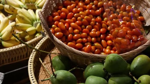 Colorful Tropical Fruits and Vegetables in Baskets