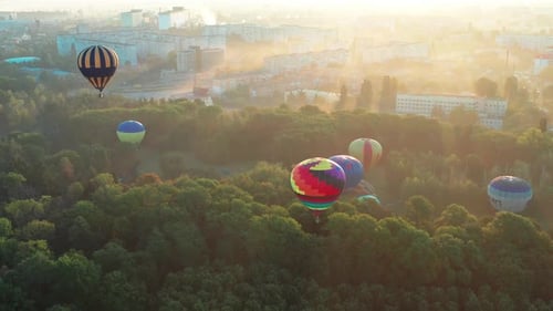 Beautiful top view of the balloons. Balloons fly over the park.