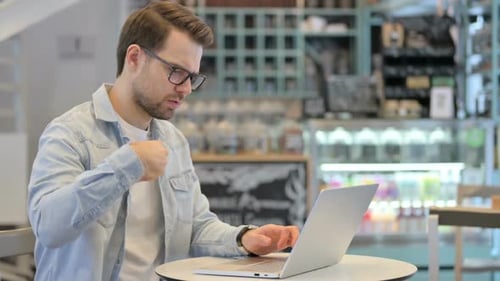 Young Adult Types on Laptop, Experiences Wrist Pain