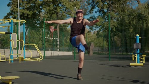 Active Senior Elderly Old Caucasian Man Do Physical Exercises in Sport Playground. Fitness Leisure