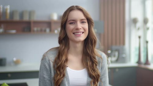 Beautiful Woman Smiling in Her Kitchen