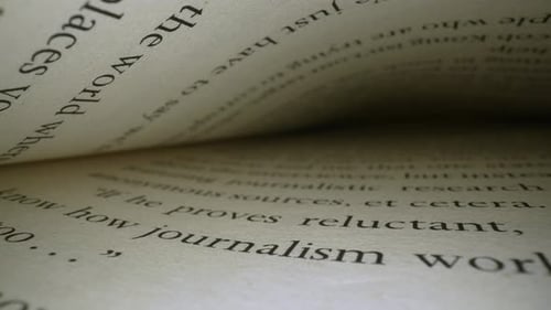 Close Up of Book Pages Moving Slowly