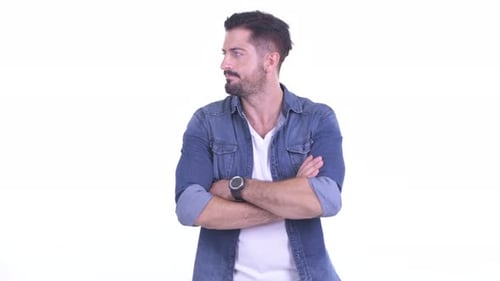 Estressado jovem barbudo hipster homem esperando e verificando o tempo