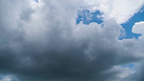Gray Clouds Time Lapse over Blue Sky