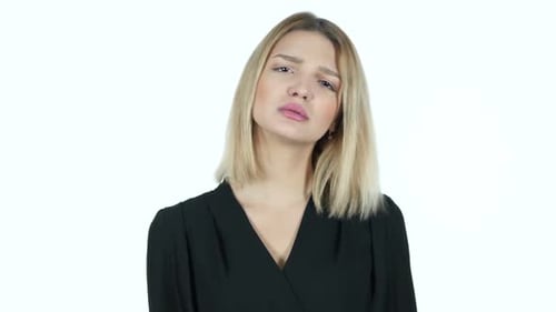 Young Adult Woman Communicating Dislike on White Background