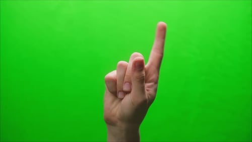 Nahaufnahme einer Handgeste auf grünem Hintergrund Aufnahme einer Gestik im Studio Schütteln des Fingers auf
