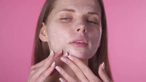 Woman with Cream on Face Posing