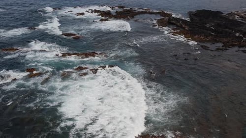 Sea Water Waves Break on Rocks