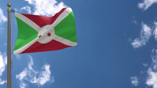 Realistic Burundi Flag Waving on Flagpole with Blue Sky