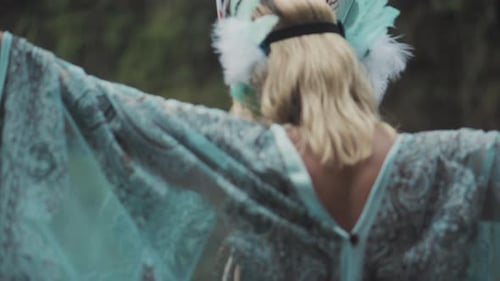 Woman with Folk Style of Indian is Dancing in Woodland