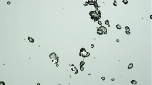 Water pouring and splashing in ultra slow motion 1500fps on a reflective surface - WATER POURS 135