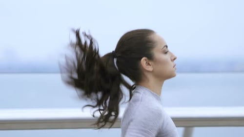 Young woman jogging.