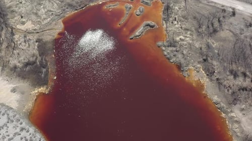 Rust-Colored Lake From Above